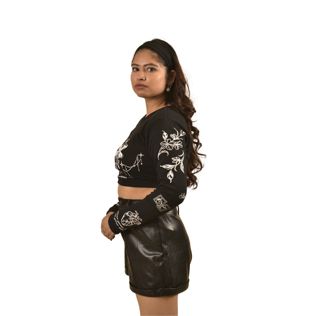 NVRFLD black club top t-shirt with white floral designs worn by model in leather shorts