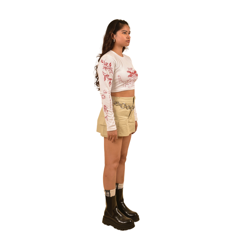 NVRFLD white long sleeve crop top t-shirt with red floral print, styled as modern clubwear