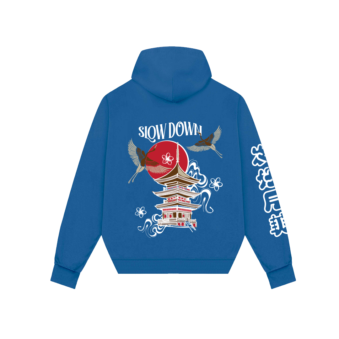 Blue Japanese design hoodie by NVRFLD with pagoda, cranes, and Slow Down text on back and sleeve