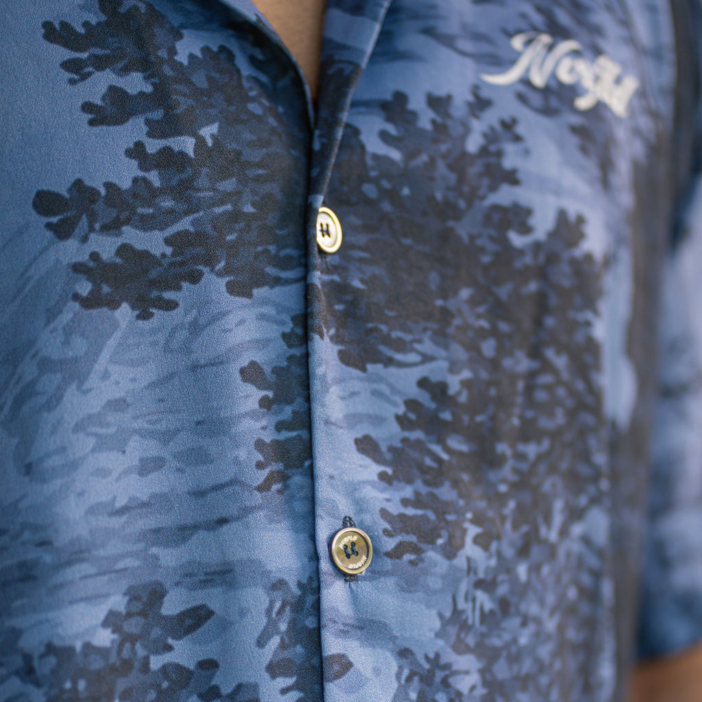 NVRFLD contemporary statement shirt in blue with button-up front and abstract black pattern