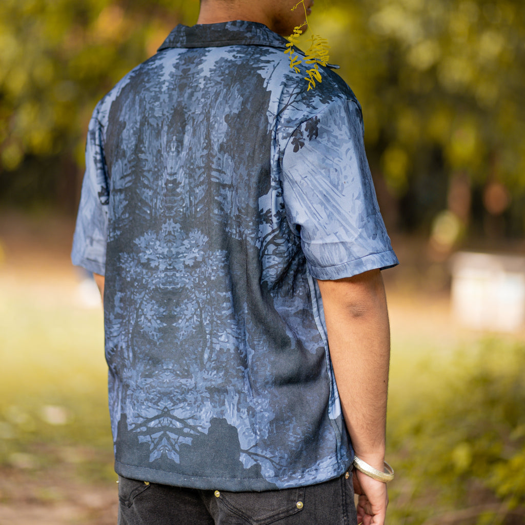 NVRFLD contemporary statement shirt featuring a blue and black abstract pattern on the back