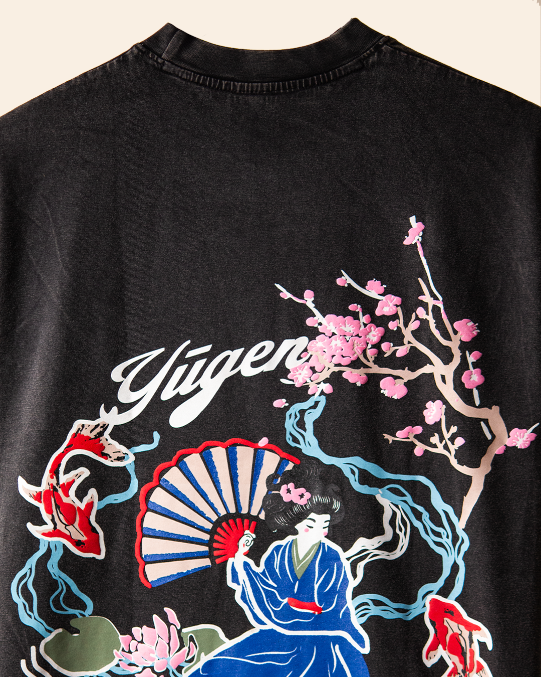 NVRFLD black artistic tee with unique design featuring Japanese woman with fan and pink cherry blossoms