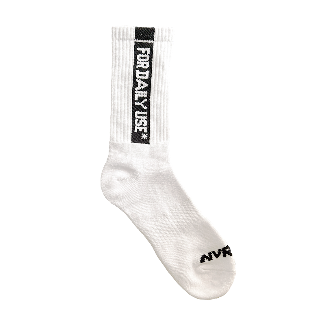 NVRFLD white daily use socks with black vertical text design and ribbed cuff for comfortable wear