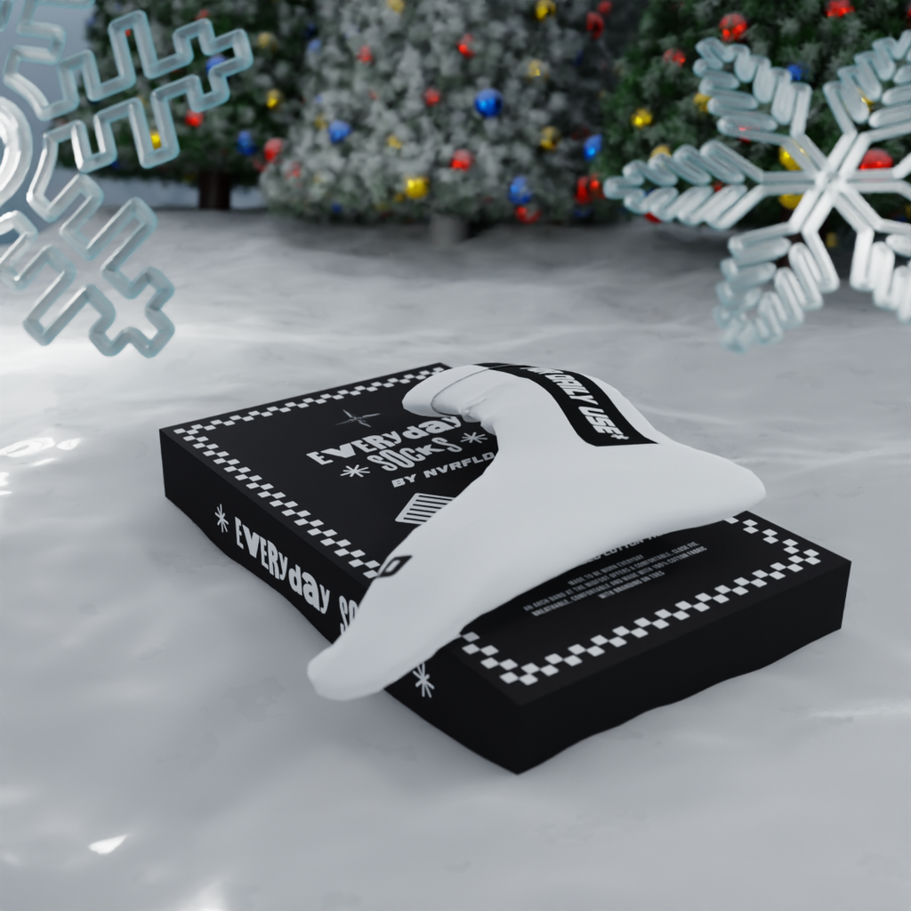 NVRFLD white daily use socks displayed on black packaging with festive holiday decorations