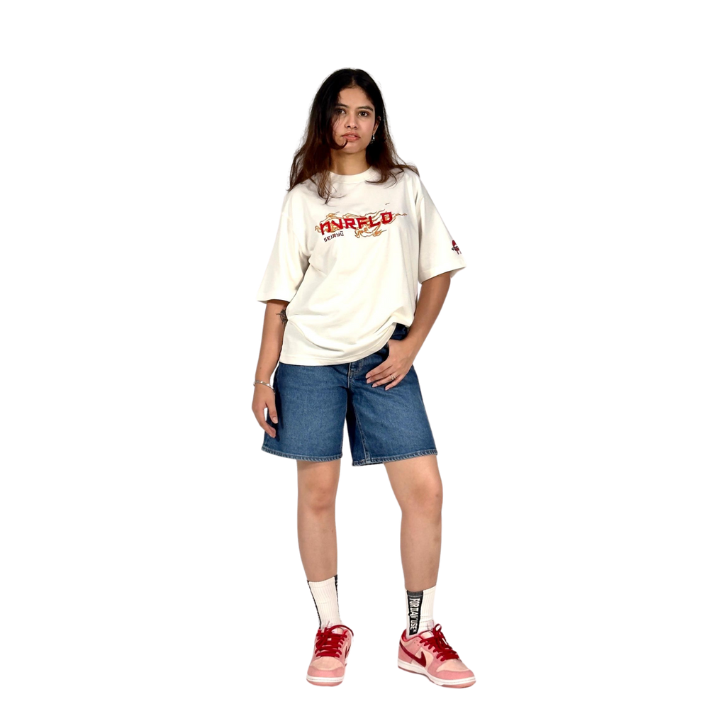 NVRFLD dragon graphic tee white oversized t-shirt worn with denim shorts and red sneakers