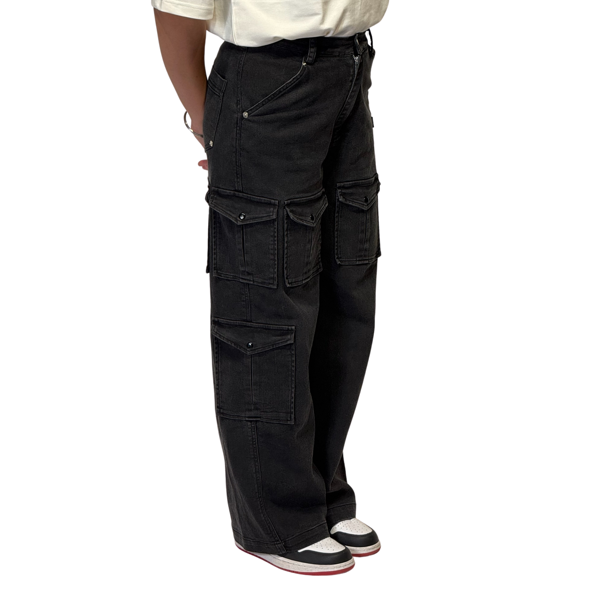 NVRFLD black utility cargo pants with multiple pockets and relaxed fit on model