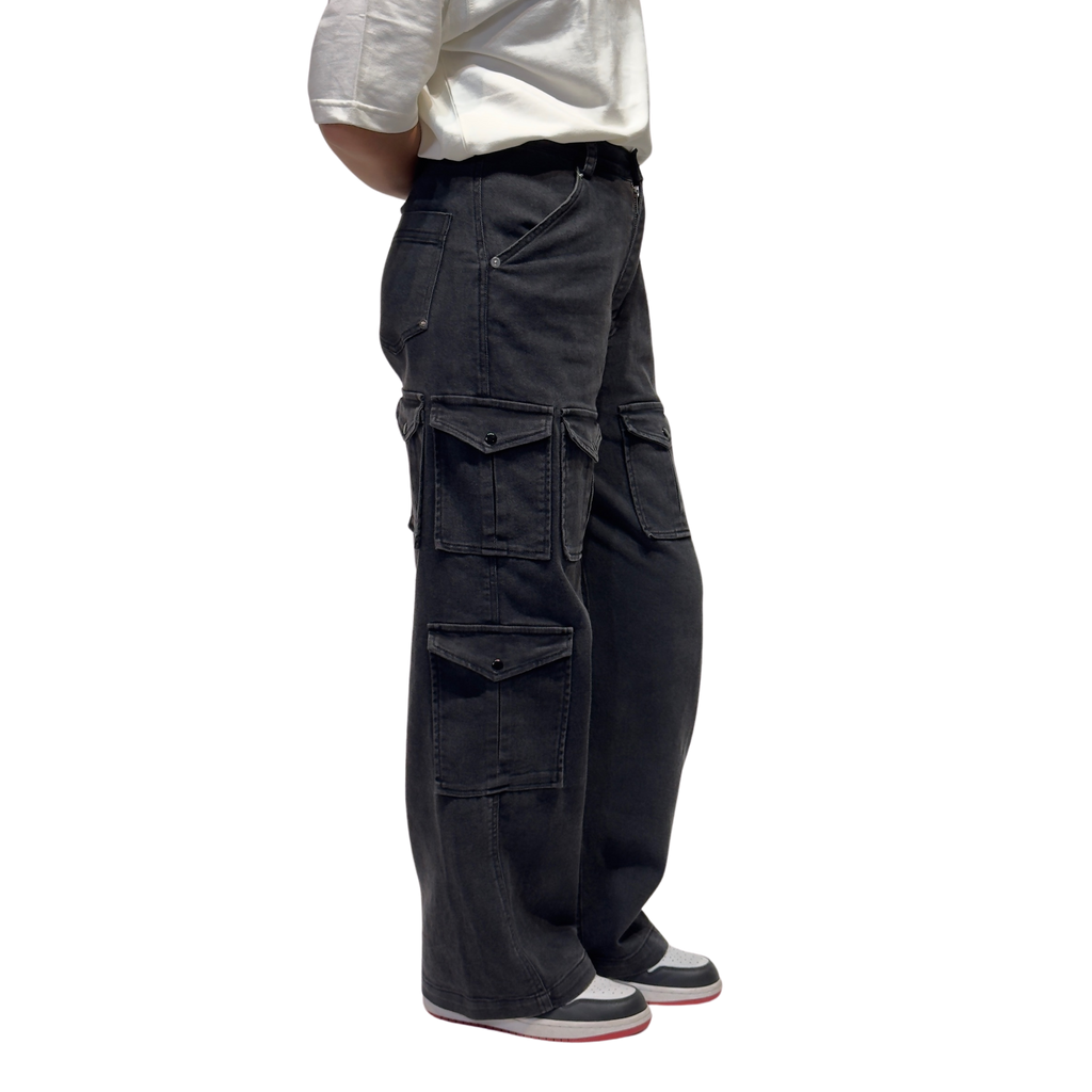 NVRFLD black utility cargo pants with multiple pockets and relaxed fit shown on model