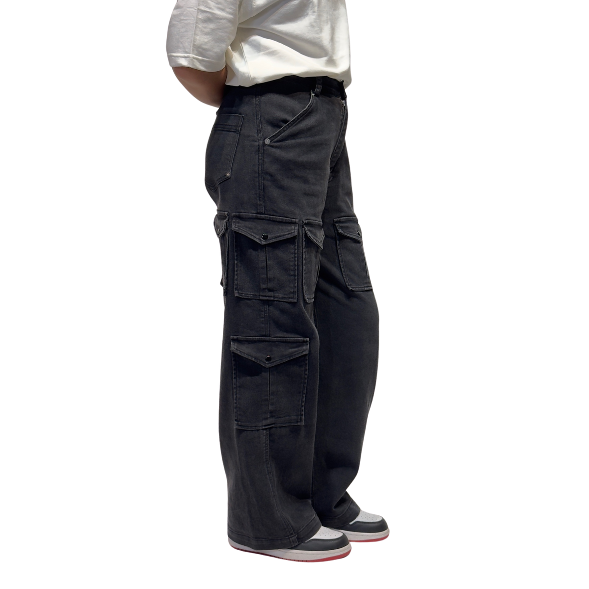 NVRFLD black utility cargo pants with multiple pockets and relaxed fit shown on model