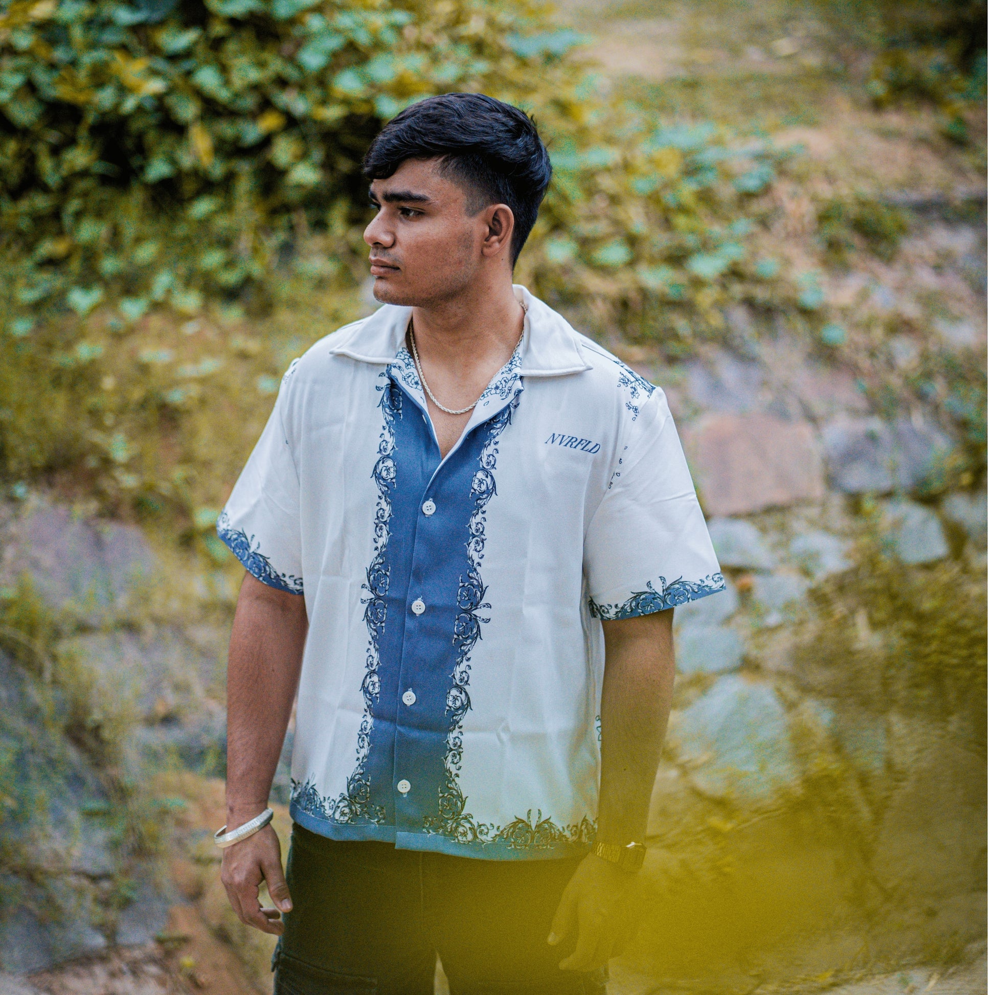 NVRFLD Renaissance shirt for men in white and blue with floral patterns worn outdoors